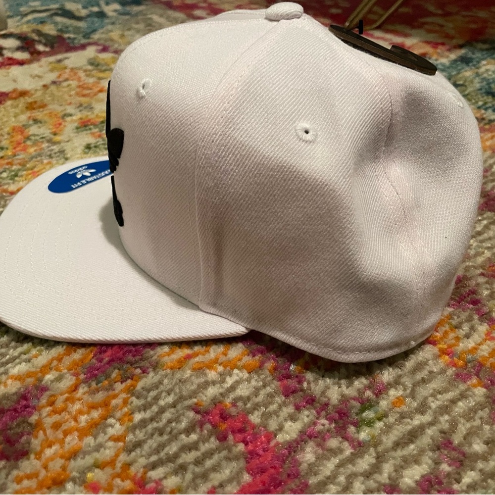 White Adidas snap back hat with Black lettering